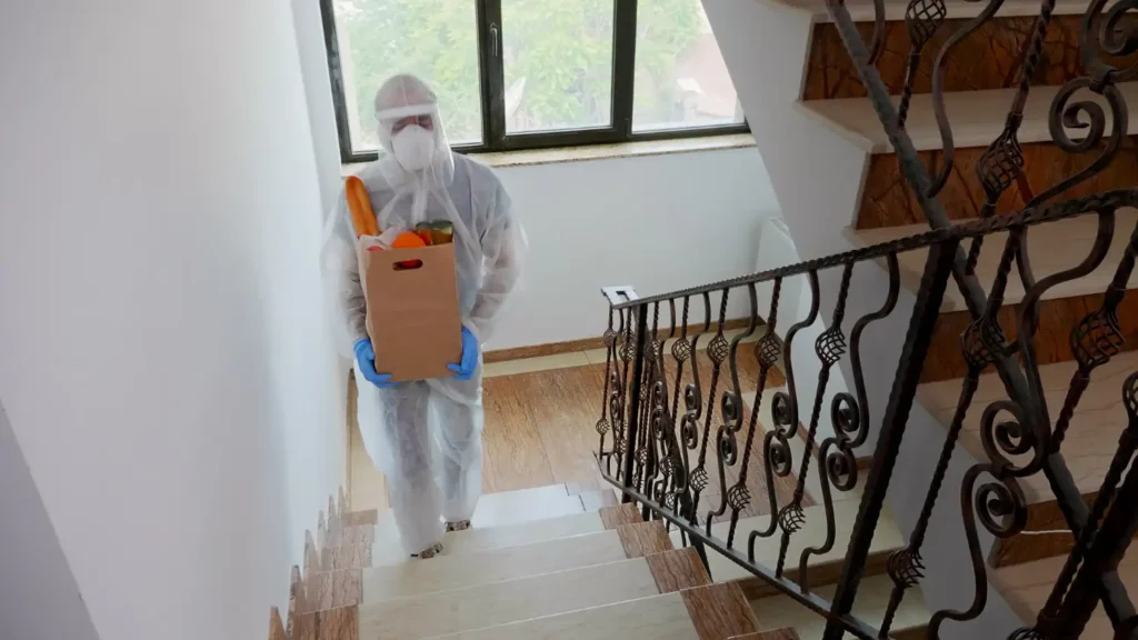 Certified specialist in PPE showing how to test for mold in your home safely in Tampa